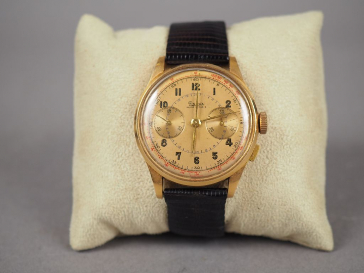 FLOREX. Montre d'homme, boitier en or jaune, bracelet cuir.  Numérotée