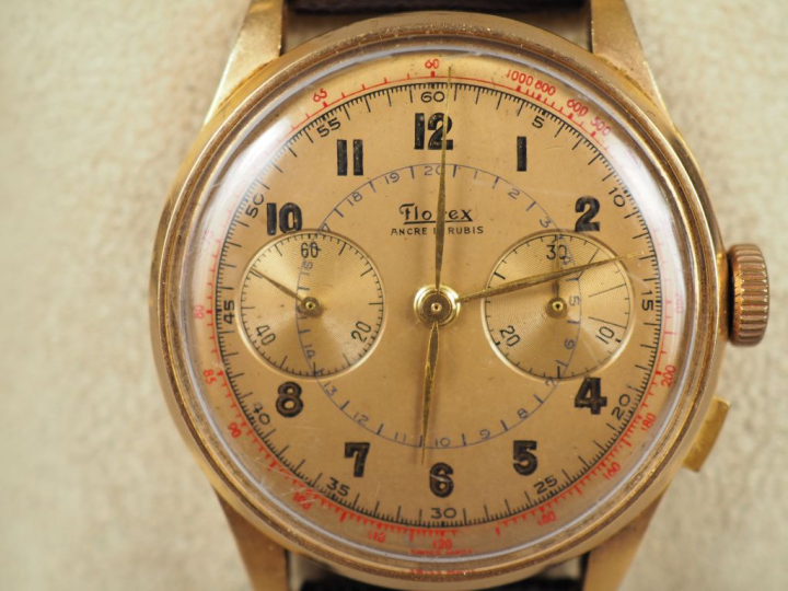 FLOREX. Montre d'homme, boitier en or jaune, bracelet cuir.  Numérotée