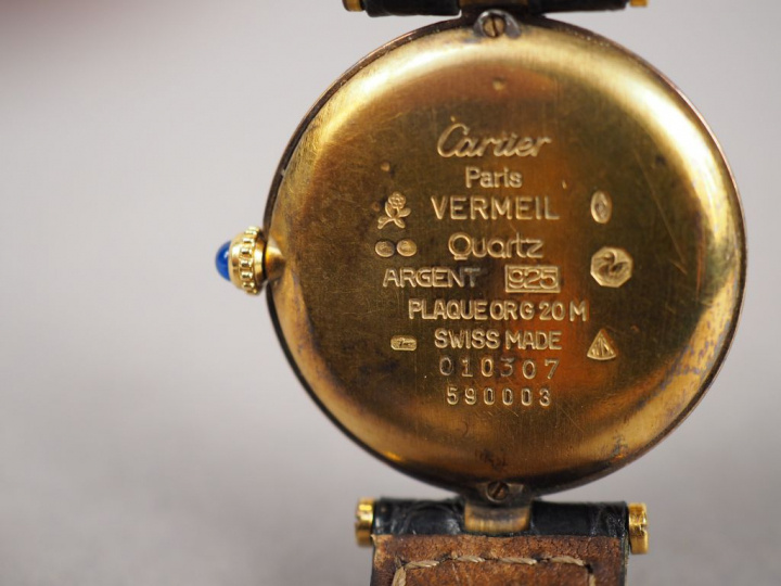MUST de CARTIER.  Montre de dame en vermeil, bracelet cuir d'origine. 