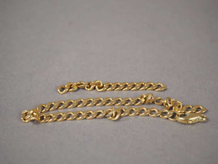 Bracelet souple en or jaune 9K, maille gourmette. Poids. 12,11 g (acci