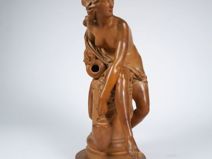 A. CARRIER BELLEUSE. "Jeune fille aux amphores". Sculpture en terre cu
