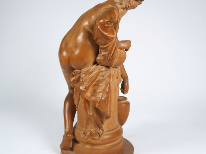 A. CARRIER BELLEUSE. "Jeune fille aux amphores". Sculpture en terre cu