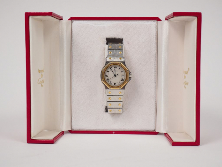 CARTIER.  Montre d’homme, modèle "Santos" en or et acier. Signée. Numé