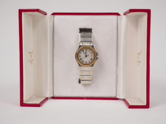 Vente aux enchères CARTIER.  Montre d’homme, modèle "Santos" en or et acier. Signée. Numé