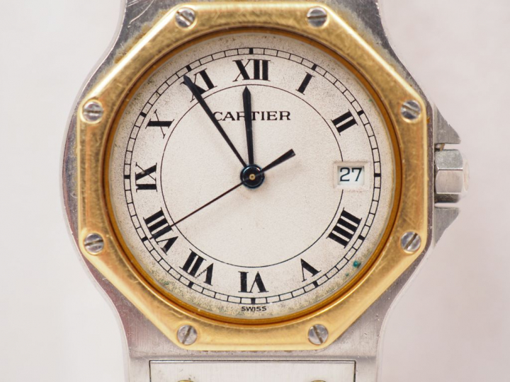 CARTIER.  Montre d’homme, modèle "Santos" en or et acier. Signée. Numé