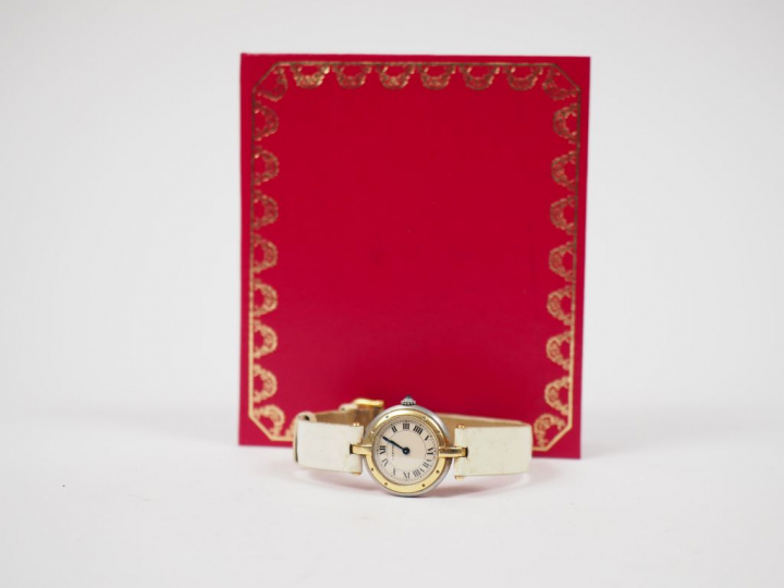 	CARTIER. Montre de dame, modèle "Panthère" en or et acier.  Bracelet 