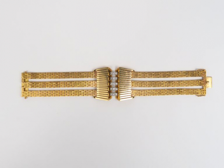Bracelet de style Art déco en or jaune, orné en son centre de quinze p