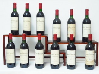 Vente aux enchères 12 BOUTEILLES ST EMILION HERITIERS FOURCAUD LAUSSAC -1986 - BG à LB