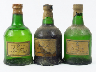 Vente aux enchères 3 BOUTEILLES EAU DE VIE DANFLOU : 1 POIRE - 1 FRAMBOISE - 1 QUETSCH