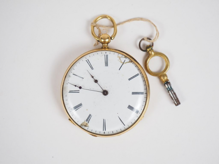 Montre de gousset en or jaune. Le revers à décor d'un cartouche. Cadra