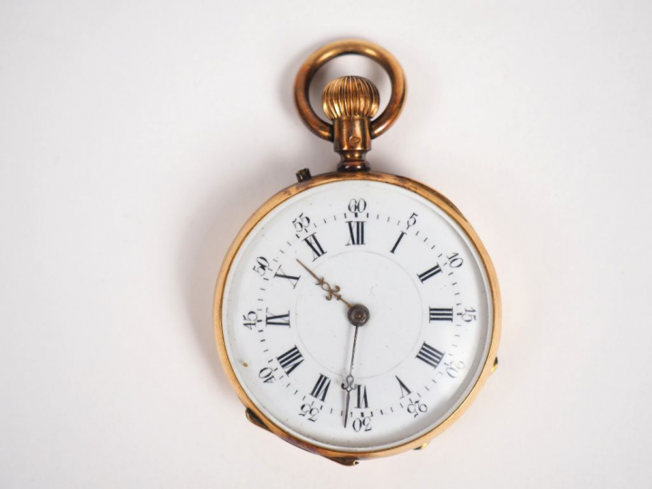 Montre de col en or jaune.  Poids tel. 27,15 g