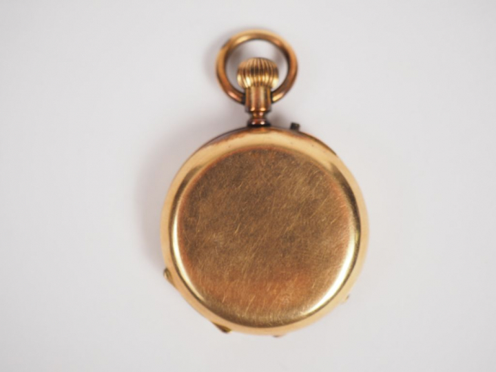 Montre de col en or jaune.  Poids tel. 27,15 g