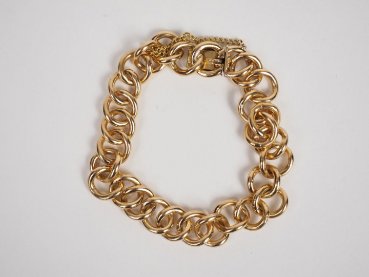 Bracelet gourmette en or jaune.  Poids. 28,81 g