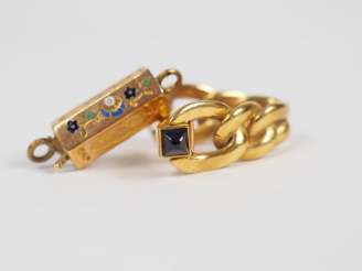 Vente aux enchères Lot comprenant :  - un bouton de manchette en or jaune et pierre bleue