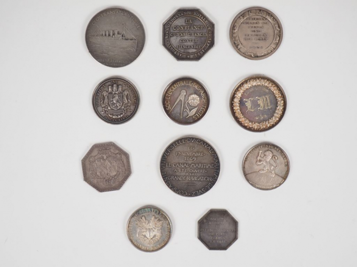 Ensemble de onze différentes médailles en argent.  Poids. 213 g