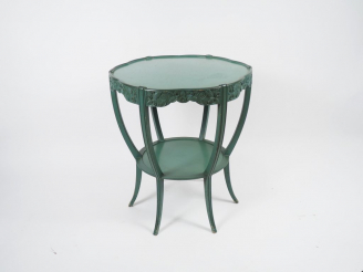 Vente aux enchères Léon JALLOT. Guéridon Art Déco en bois sculpté et laqué vert, à décor 