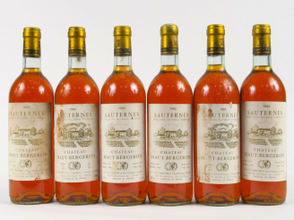 Vente aux enchères 6 BOUTEILLES CHÂTEAU HAUT BERGERON SAUTERNES - 1982 - BG++