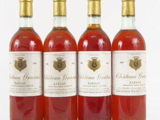 Vente aux enchères 4 BOUTEILLES CHÂTEAU GRAVAS P. BERNARD BARSAC - 1985 -3 BG/1 LB