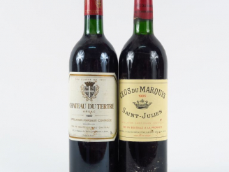 Vente aux enchères 2 BOUTEILLES : 1 CHÂTEAU DU TERTRE GC MARGAUX 1985 BG - 1 CLOS DU MARQ