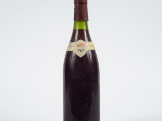 Vente aux enchères 1 BOUTEILLE GEVREY CHAMBERTIN H. REBOURSEAU - 1987 - SE/BOUCHON ESTAMP