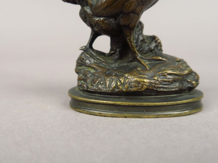 CAIN. "Le coq" Sujet en bronze à patine brune. Signé. H. 9,5 cm
