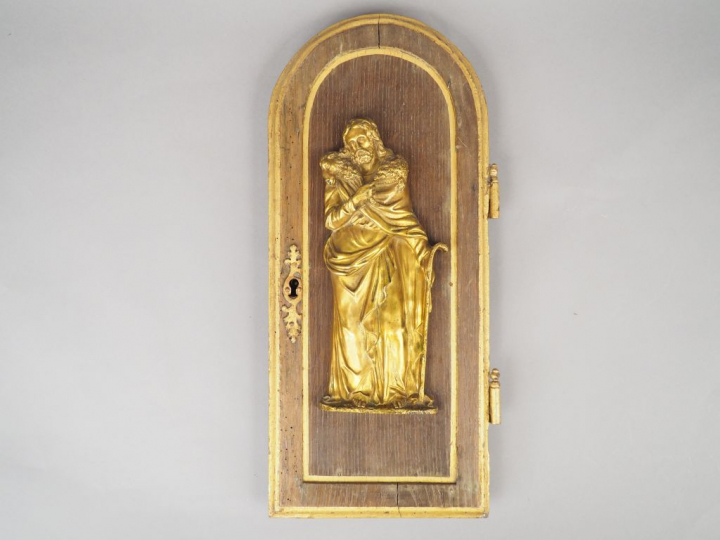Porte de tabernacle en chêne, à décor en son centre d'une représentati