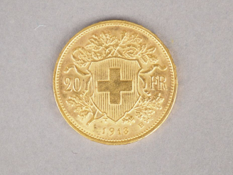 Vente aux enchères Une pièce de 20 Francs Suisse or, 1913-B. FRAIS ACHETEUR : 5% TTC