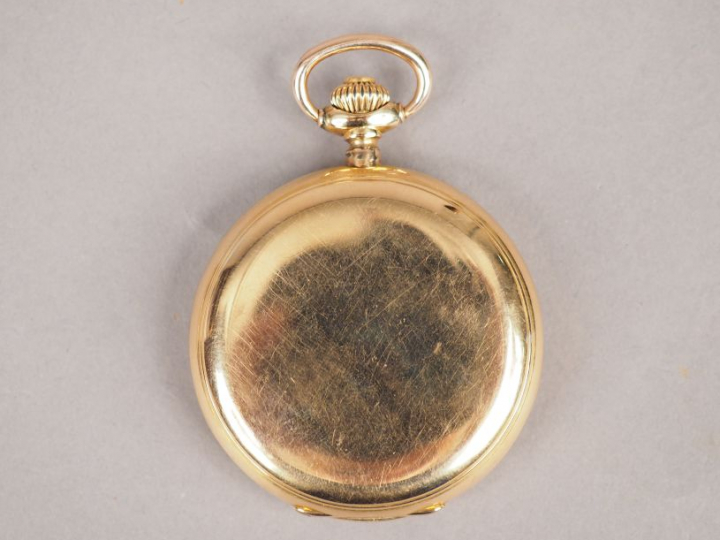 Montre de gousset aveugle en or jaune. Poids. 99,30 g (bélière en méta