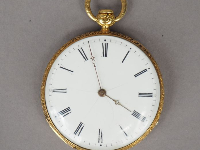 Montre de gousset en or jaune, cadran émaillé, chiffres romains. Le re