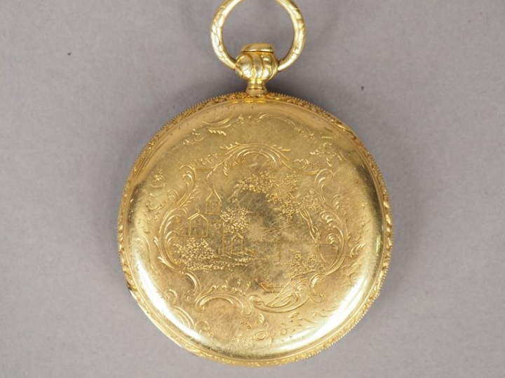 Montre de gousset en or jaune, cadran émaillé, chiffres romains. Le re