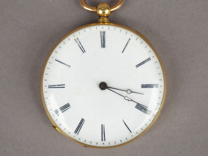 Montre de gousset en or jaune, cadran émaillé, chiffres romains. Le re
