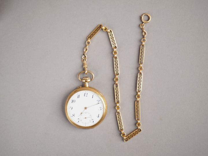 Montre de gousset en or jaune 14K et une giletière en or jaune 18K, ca