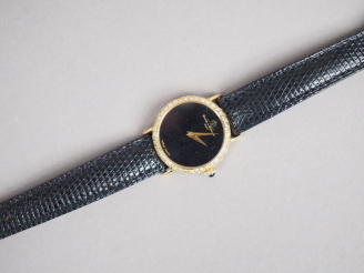 Vente aux enchères BAUME   MERCIER Montre de dame, boitier en or jaune serti de petits di