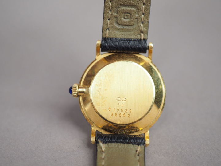 BAUME   MERCIER Montre de dame, boitier en or jaune serti de petits di