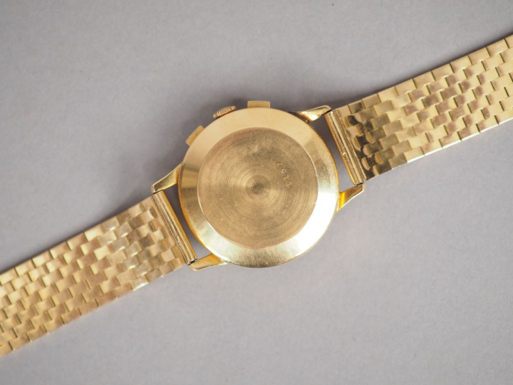 EBEL. Montre d'homme, boitier et bracelet en or jaune. Poids tel. 80,8