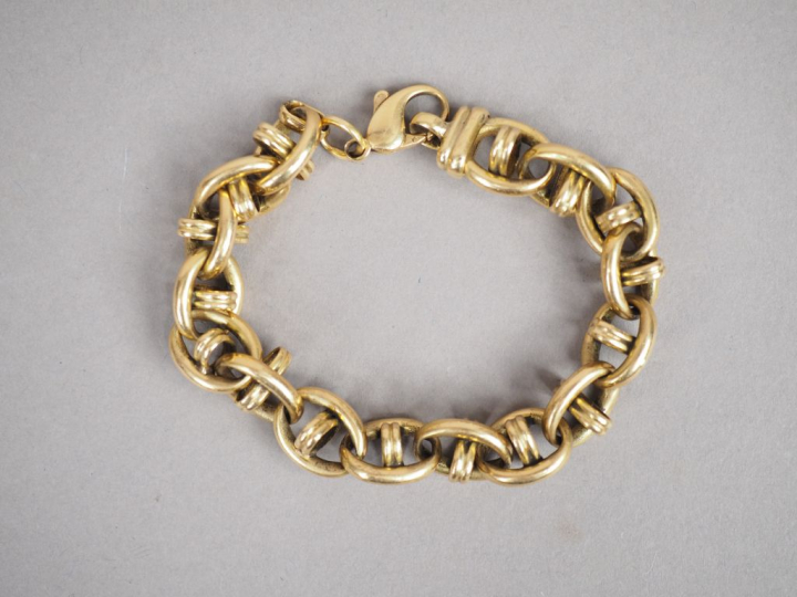 Bracelet articulé en or jaune, maille forçat. Poids. 44,98 g