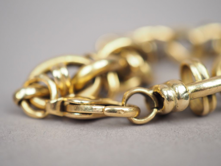 Bracelet articulé en or jaune, maille forçat. Poids. 44,98 g
