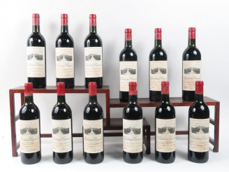 Vente aux enchères 12 BOUTEILLES CHÂTEAU CANON 1er GCC ST EMILION - 1979 - CBO -  4 BG/5 