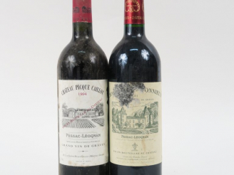 Vente aux enchères 2 BOUTEILLES : 1 CHÂTEAU CARBONNIEUX GCC GRAVES 2001 EA - 1 CHÂTEAU PI