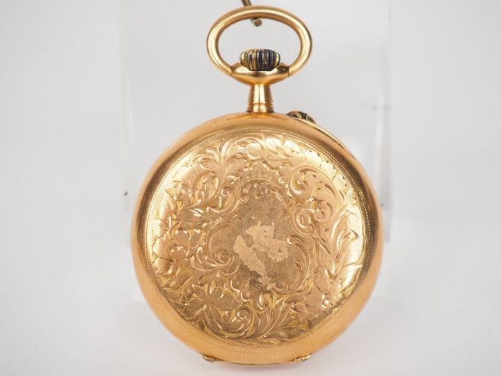 Montre de gousset en or jaune. Cadran émaillé blanc à chiffres arabes 