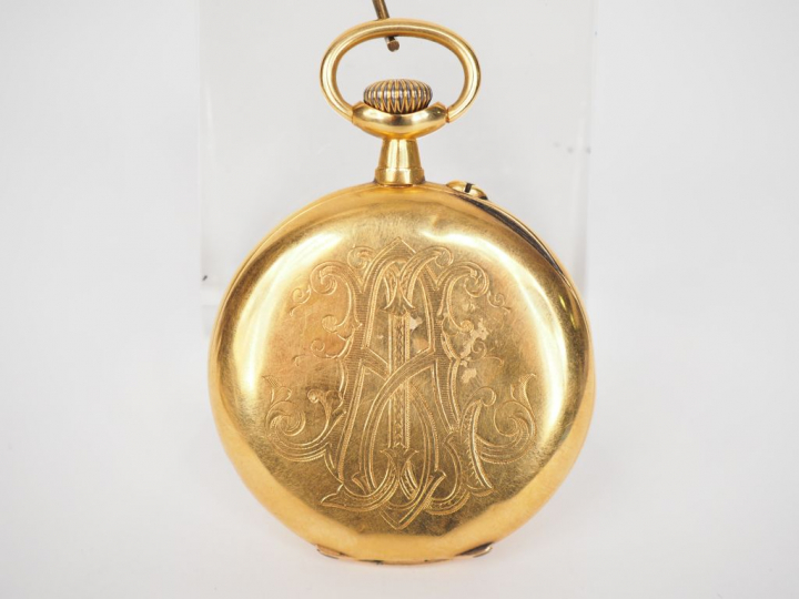 Montre de gousset en or jaune. Cadran émaillé blanc à chiffres arabes 