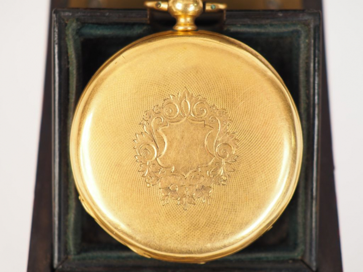 	Montre de gousset en or jaune.  Cadran émaillé blanc à chiffres arabe