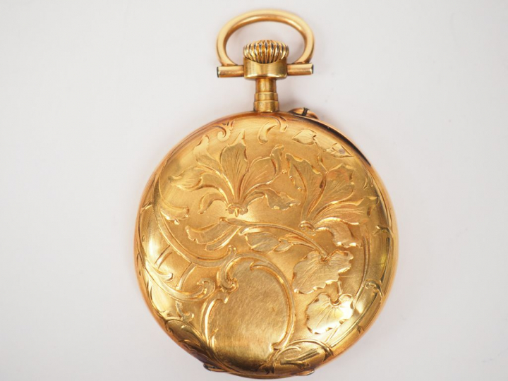 Montre de gousset en or jaune.  Cadran blanc à chiffres arabes pour le