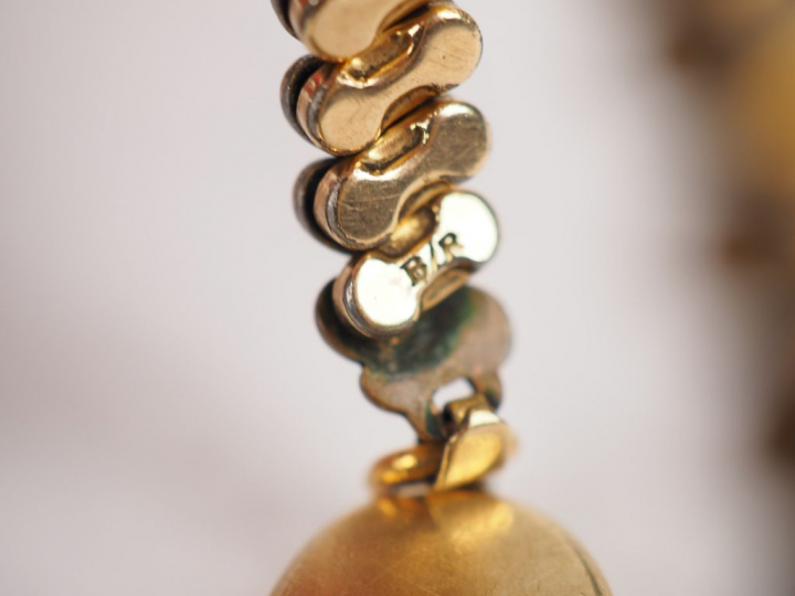 RUBEN. Montre bracelet de dame, boitier en or jaune 14K. Cadran sertie