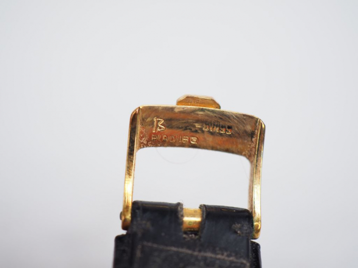 CHOPARD. Montre de dame, boitier de forme hexagonale en or jaune.  Bra