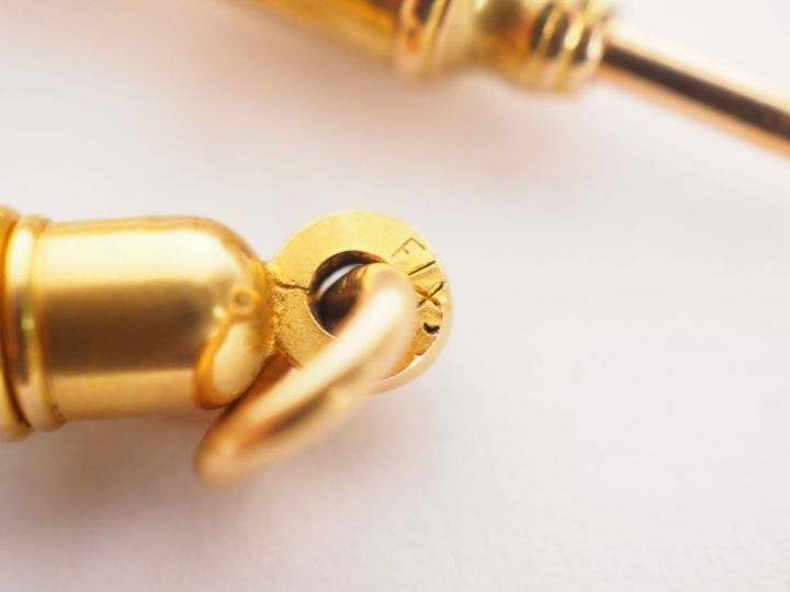 Ensemble comprenant :  - un porte-mine en or jaune  Poids tel. 5,69 g 