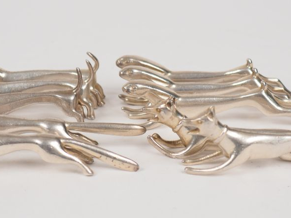 Benjamin Rabier (d'après) Suite de dix porte-couteaux en forme d'anima