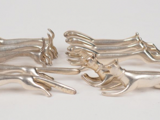 Vente aux enchères Benjamin Rabier (d'après) Suite de dix porte-couteaux en forme d'anima