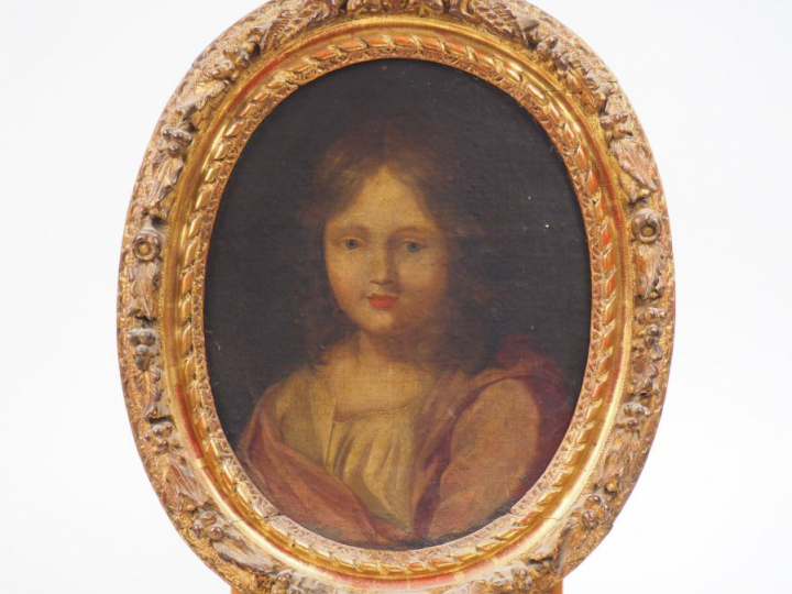 Ecole françasie. 'Portrait d’enfant'. Huile sur toile, marouflée sur c
