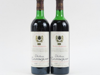 Vente aux enchères 2 BOUTEILLES CHÂTEAU BEAU SÉJOUR BÉCOT 1er GCC ST EMILION - 1975 - 1 H